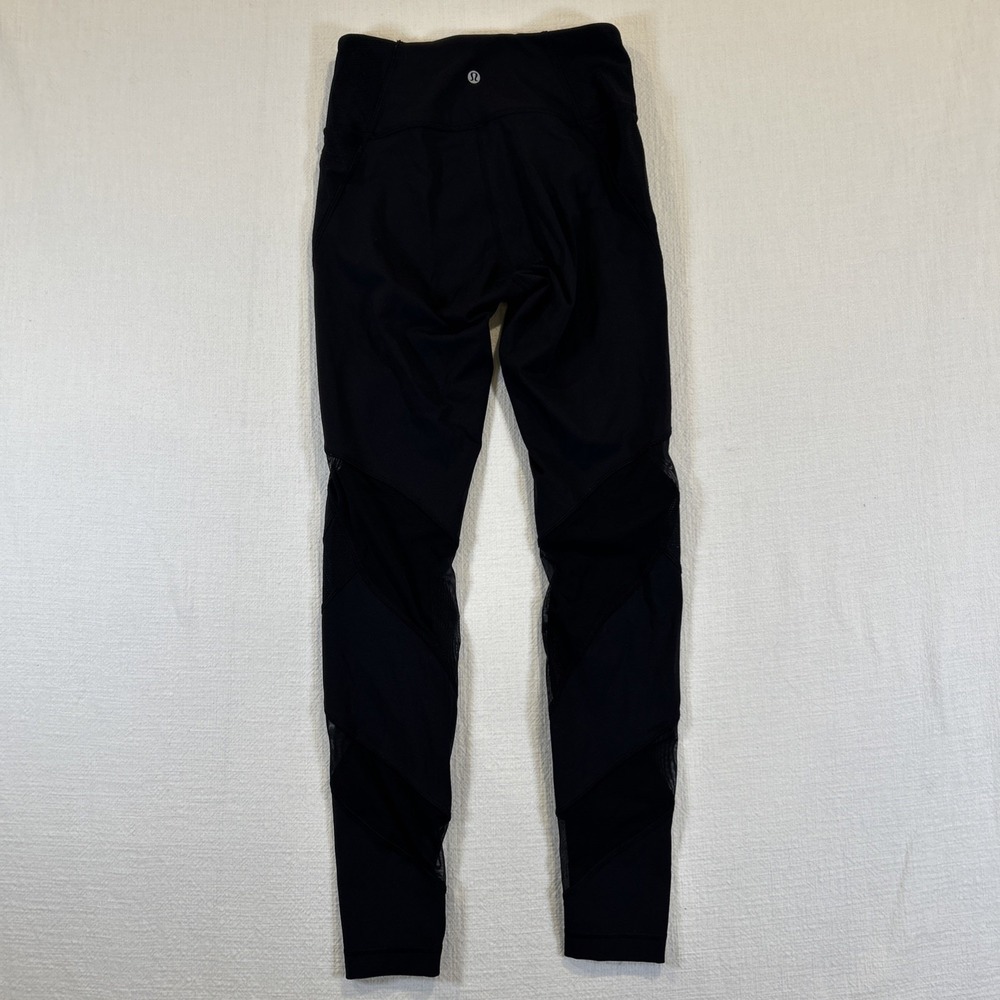 Lululemon‎ Women's Black Leggings Size 6 Pockets Mesh Criss Cross Detail